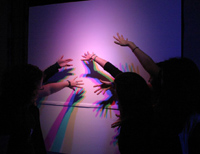 Students demonstrate light and shadows