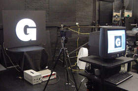 Test sign and digital imaging system used to evaluate luminance uniformity