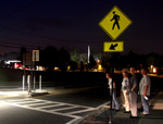 Pedestrians at a roundabout crosswalk